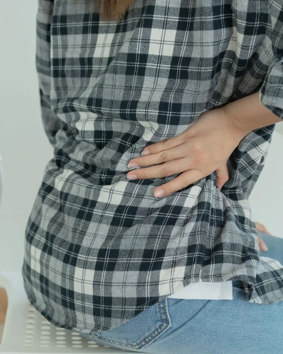 Chiropractor examining herniated disc and spinal compression in Lenexa, Kansas