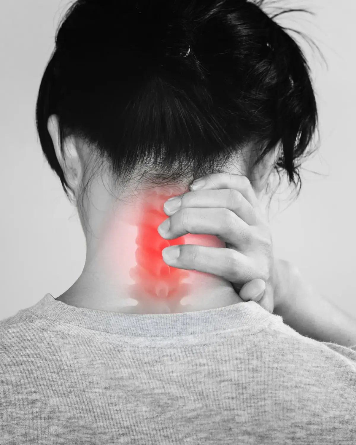 Doctor performing cervical spine adjustment for neck pain in Lenexa, KS